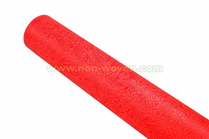 Red wrapping paper nonwoven
